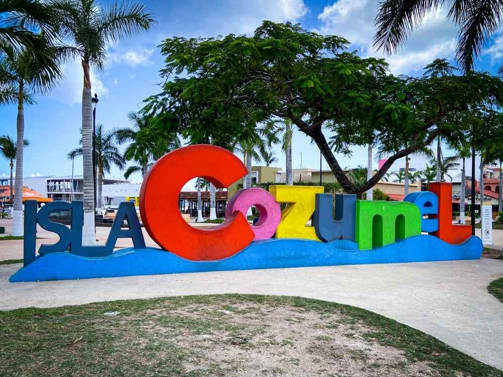 A colorful sign of Isla Cozumel for kids and families on the island of Cozumel